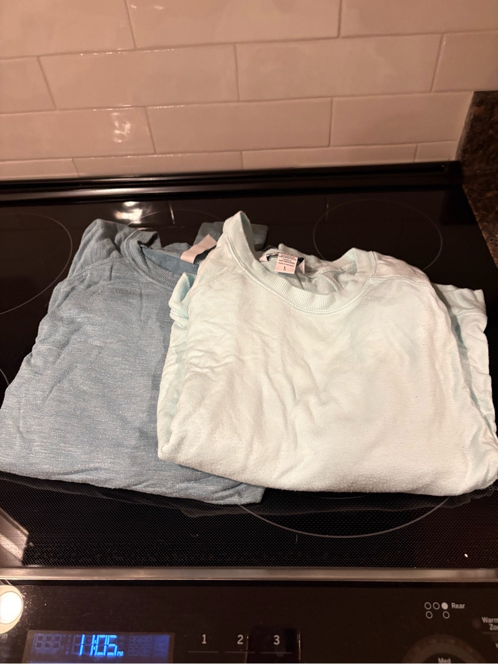 Bundle of two Athleta long sleeve shirts, size large